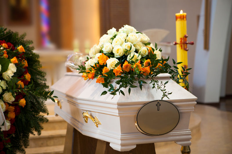 funeral flowers on coffin